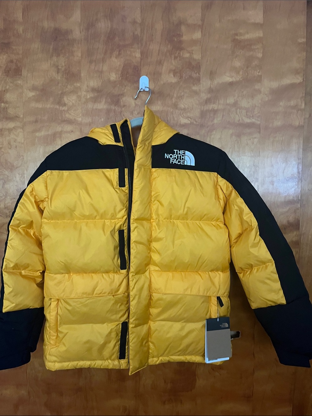 The North Face Yellow and Black Kids Puffer Jacket